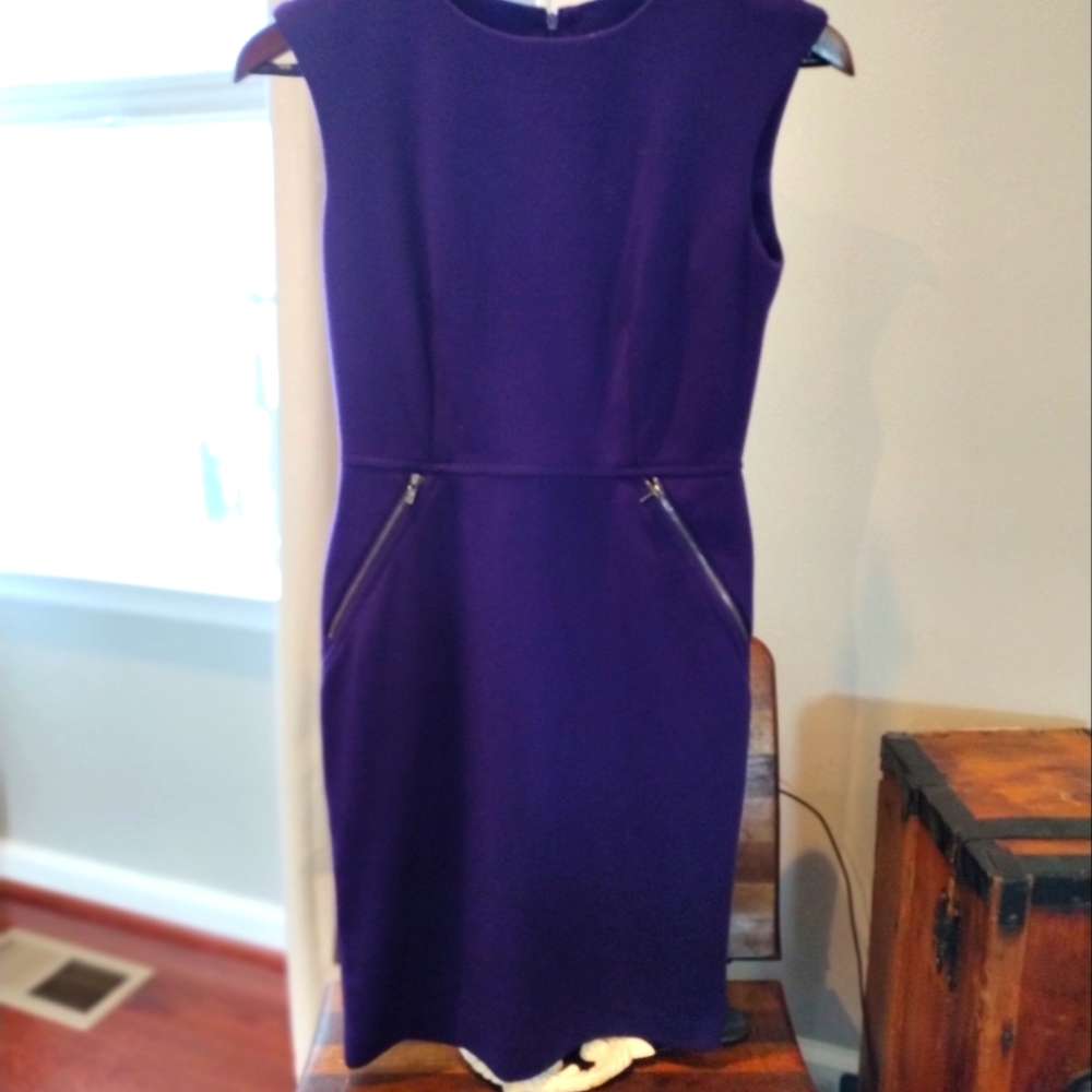 Form fitting classic Calvin Klein dress in a beautiful plum purple